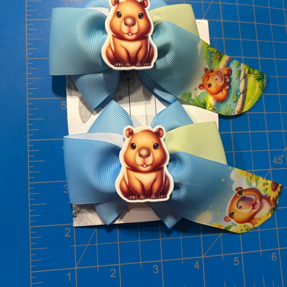 Blue and Yellow Kids Hair Bow with Cute Animal Design